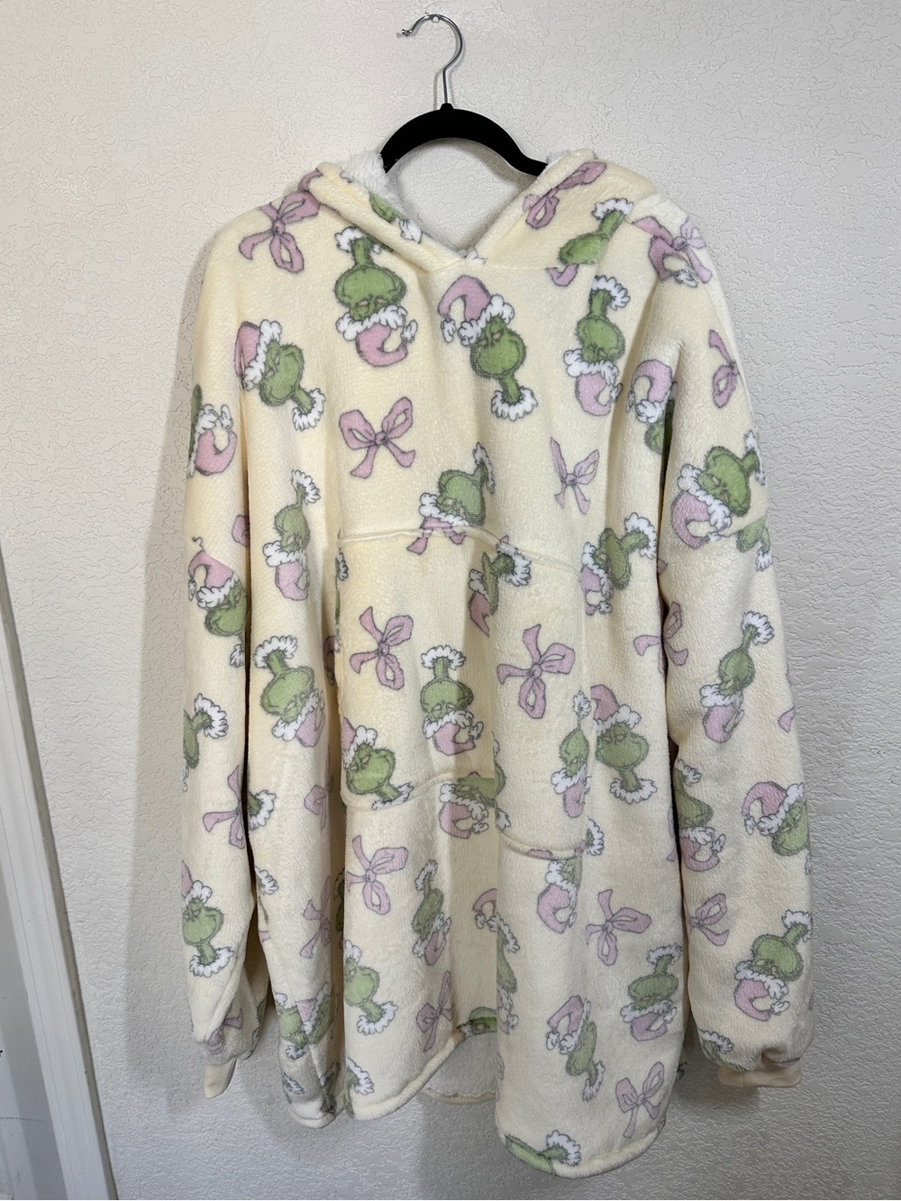 The Grinch Plush Cream Oversized Blanket Hoodie with Pink & Green Grinch Print